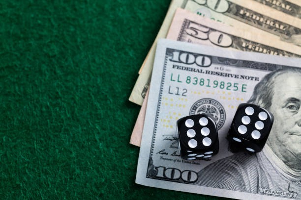 Live dealer handling cards at a studio table